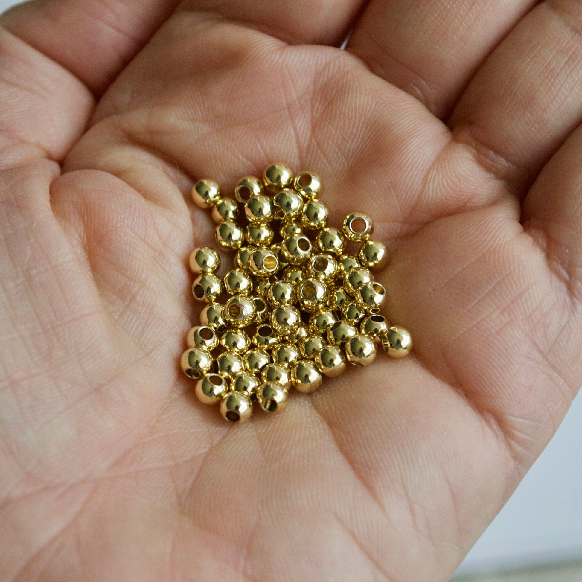 14k gold filled spacer beads close up detail smooth finish