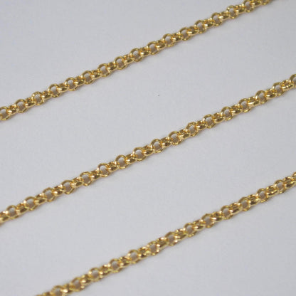 Gold filled 2mm rolo chain on a light gray background