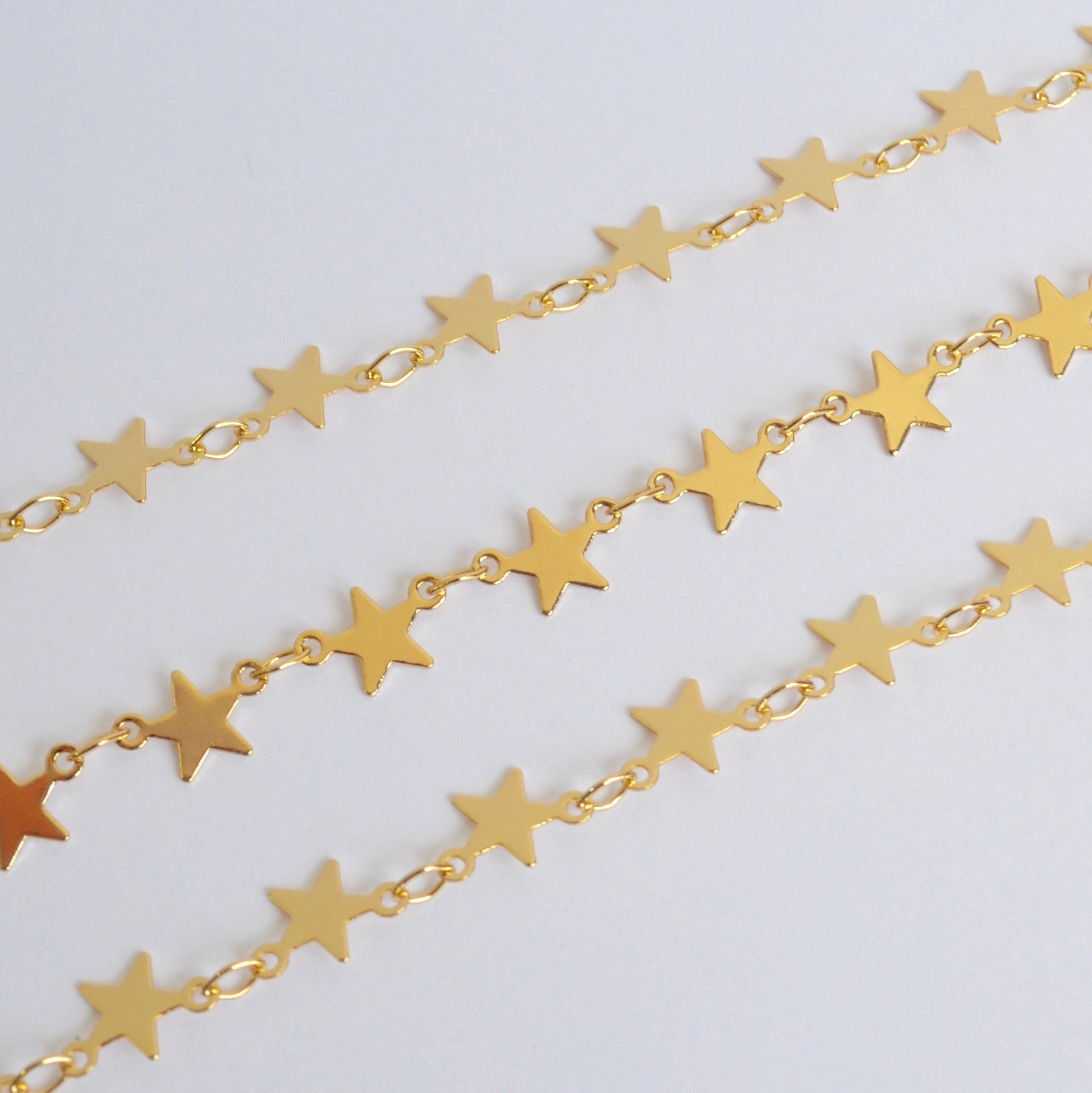 Gold filled star chain close up detail showing star links by the foot